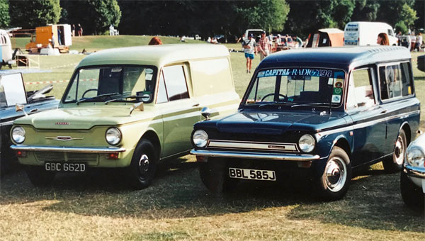 Pale green van and dark blue Husky